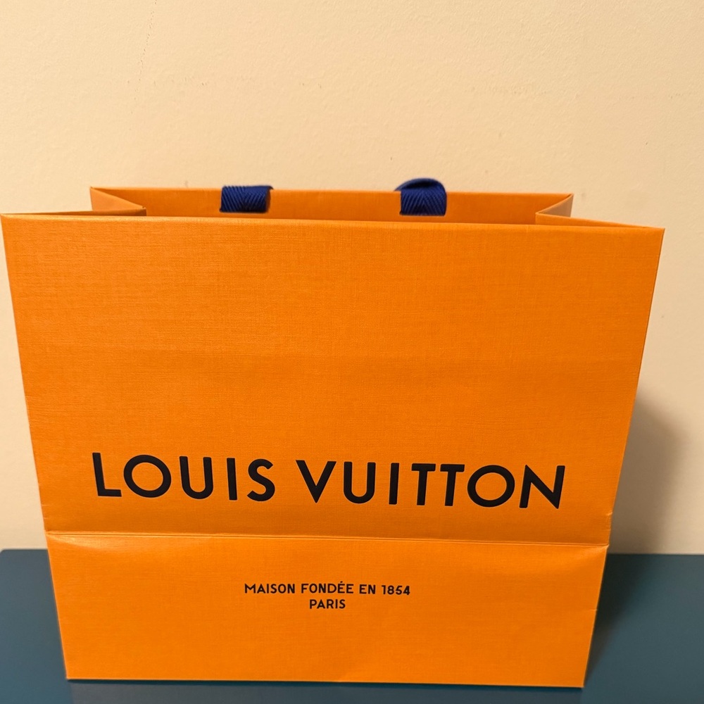 Louis Vuitton Bold Orange Shopping Bag with Blue Handles